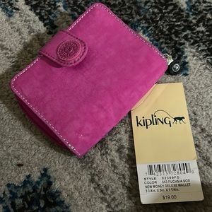 Hot pink vintage Kipling wallet. Still has tags